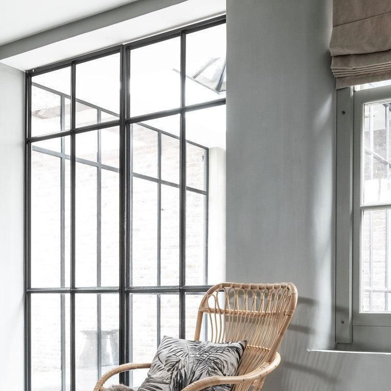 Rotan fauteuil Cantania in sfeervolle zithoek MUST Living