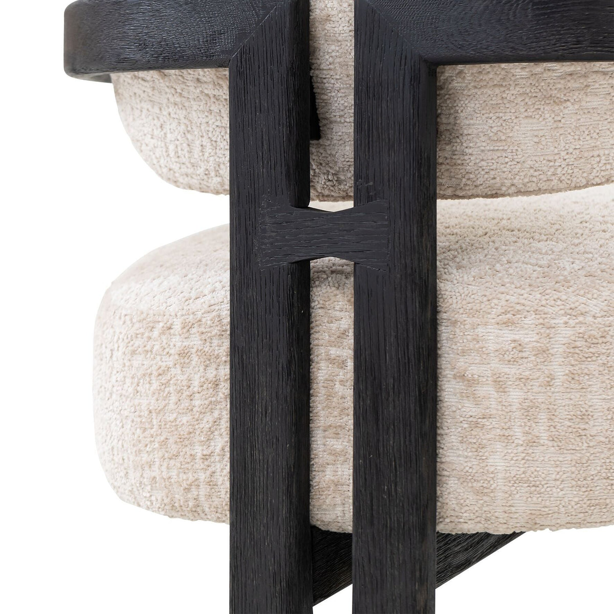 Zwarte Kelly fauteuil met gewafelde Luxor stof zijaanzicht