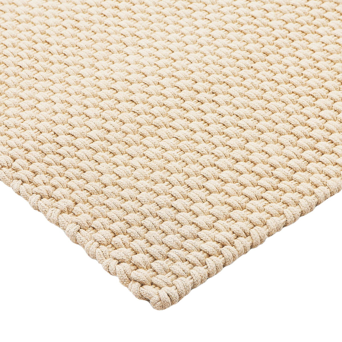 Detail van de geweven structuur van het Nomad tapijt in White Sand