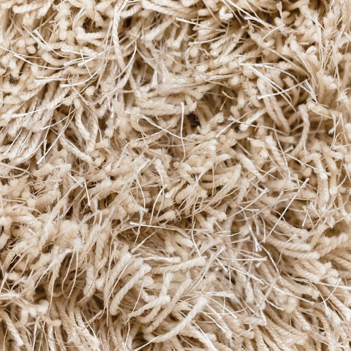 Detailfoto van Vloerkleed Crown Polyester Beige Rond 200cm van MUST Living met zichtbare structuur van het weefsel