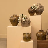 Deisy Beige Ceramic Jar With Handles Rough Coral S van PTMD, beige keramische pot in een sfeervolle interieursetting