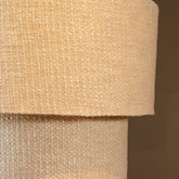 Detail Devi hanglamp van PTMD, twee lagen taupe stof met zichtbare weefstructuur