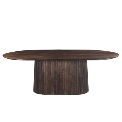 Vooraanzicht van de ovale Salvator eettafel in Walnut met twee geribbelde voeten