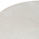 Witte ronde etagere van J-Line gestyled met planten en decoratie in een interieur