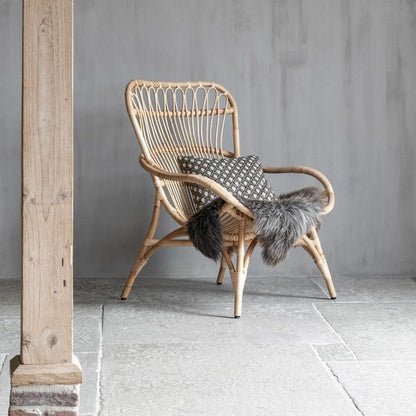 Fauteuil Cantania naturel rotan met open vlechtwerk sfeerbeeld