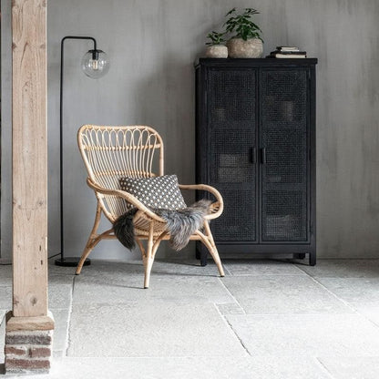 Cantania rotan fauteuil in serre met plaid MUST Living