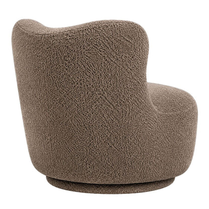 Zijaanzicht van de Dean loungefauteuil in beige boucle stof