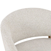 Detail van de stof en het onderstel van de fauteuil Dilan Hush Oak