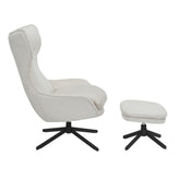 Fauteuil Olivia van Starfurn met detail van de zwarte metalen draaivoet onder de zitting