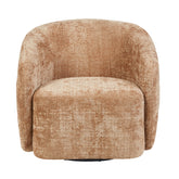 Fauteuil Yara Cinnamon van Starfurn als leesplek bij het raam met een schemerlamp