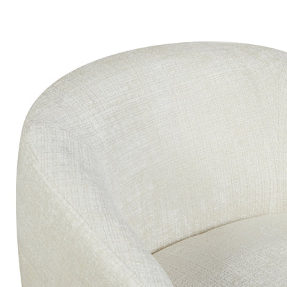 Draaibare fauteuil Yara van Starfurn in een lichte woonkamer naast een bijzettafel