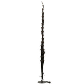 Kerstboom Led Warm Witte Lichten Ijzer Zwart Extra Large H240cm van J-Line, geplaatst in een sfeervol interieur
