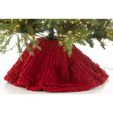 Kerstboomrok in kerstrood van J-Line met cadeaus eromheen
