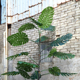 Grote kunstmonstera van PTMD van 420 cm in een ruimte met hoog plafond