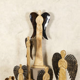 Maebha Natural Wooden Angel Statue On Base L van PTMD in een sfeervolle interieursetting