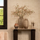 Natae Beige Round Glass Ribbed Vase High van PTMD in daglicht bij het raam