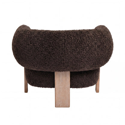 Nomy Fauteuil Teddy Bruin Rubberhout van PTMD, zitting met S-veren en poten van rubberhout
