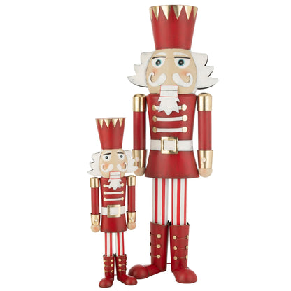 Grote notenkraker rood goud van J-Line gestyled als kerstdecoratie in een hal