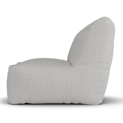 Laui Lounge loungestoel in ash grey van opzij, met rughoogte van 74 centimeter