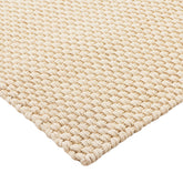 Detail van de geweven structuur van het Nomad tapijt in White Sand