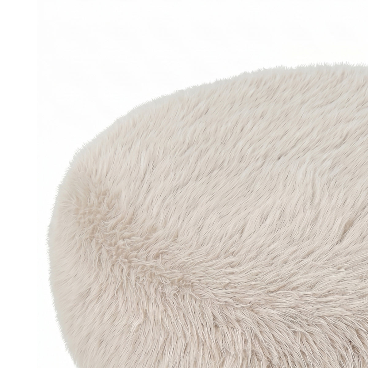 Pilo Poef Hair Stof Beige Rond Large van PTMD, lage ronde poef in beige vanuit een andere hoek