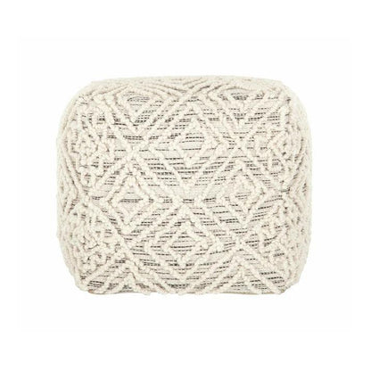 Detail van de handgeknoopte wol van de poef Quartz van MUST Living in antraciet en ivoor