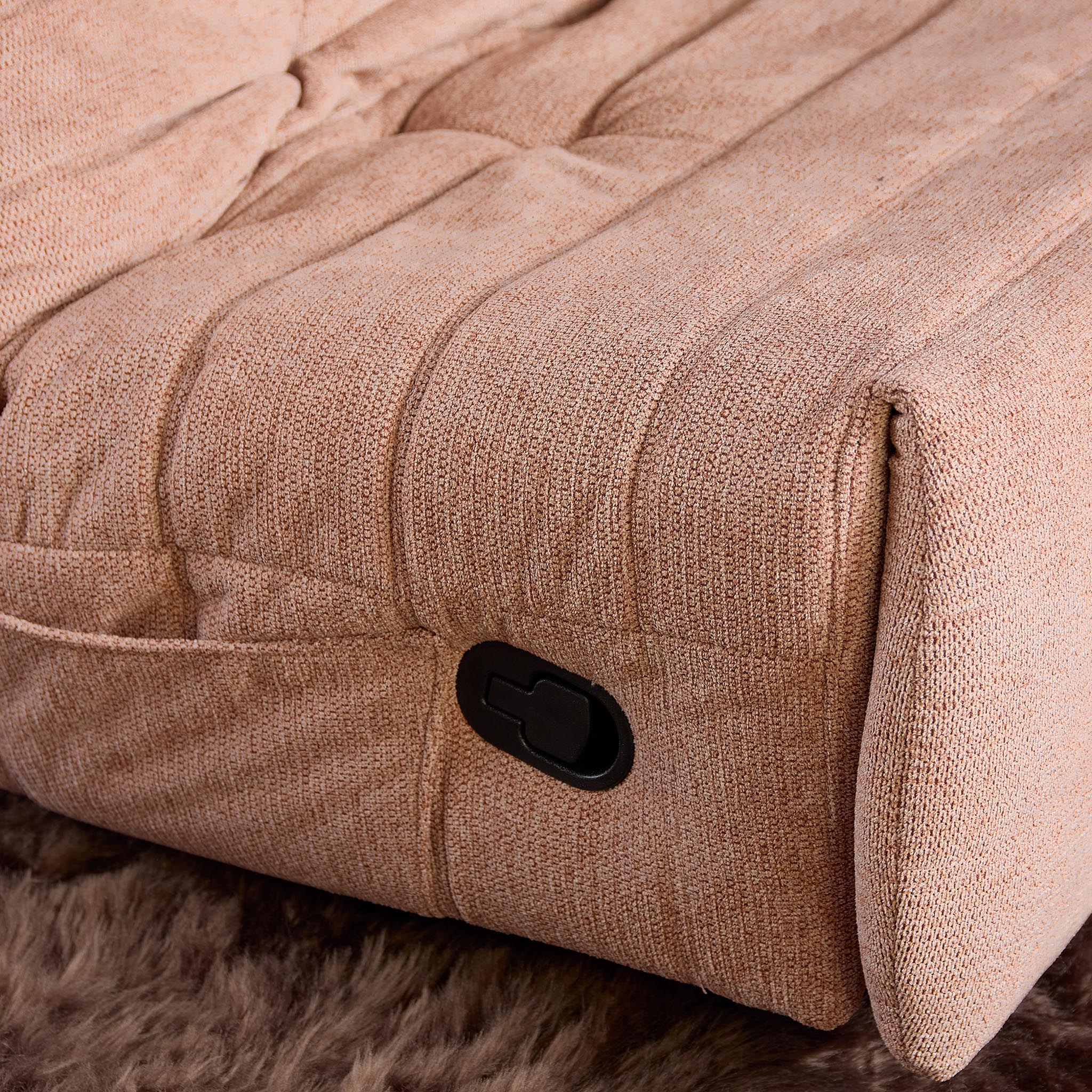 Relaxfauteuil Zen van Starfurn in roze stof, zijaanzicht met de rugleuning gekanteld
