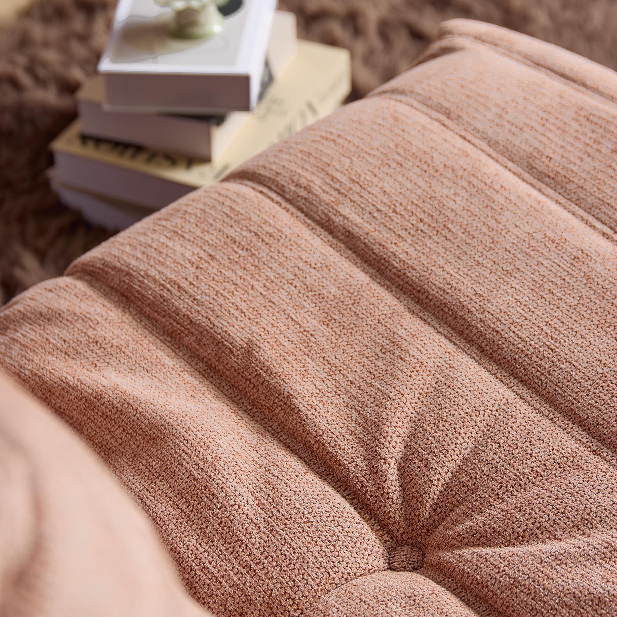 Relaxfauteuil Zen van Starfurn in roze, detail van de armleuning met plooien