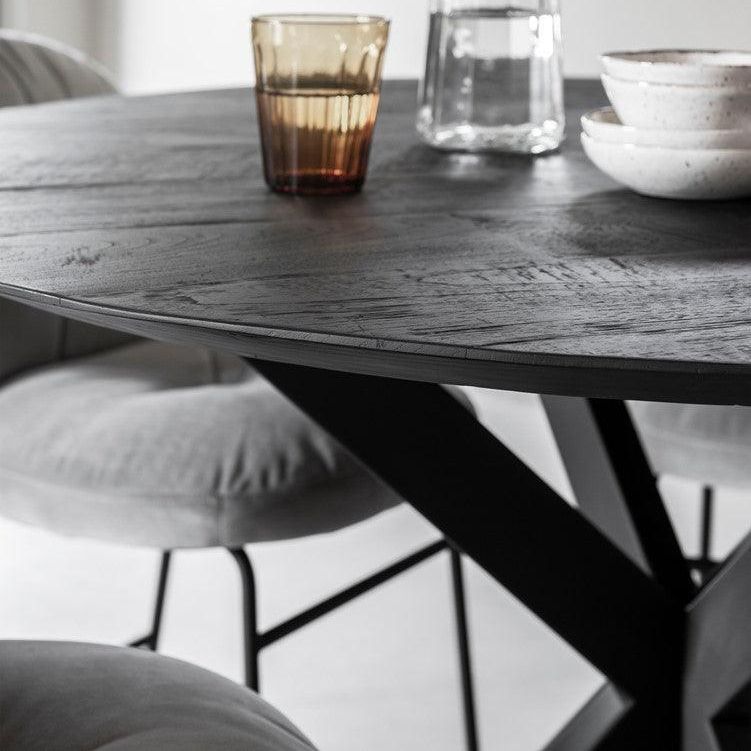 Ronde eettafel 150cm zwart teakhout met kruisende ijzeren poten