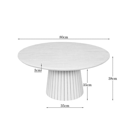 Solana salontafel 80 cm gestyled met boeken en een schaal in een woonkamer