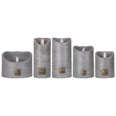 Set van 5 LED kaarsen Rustic Suede Grey van PTMD, de complete set met alle vijf de kaarsen naast elkaar op witte achtergrond