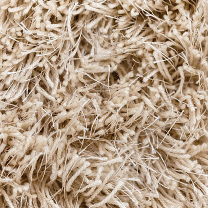Vloerkleed Crown Beige 170x240cm van MUST Living schuin van opzij gezien, met zicht op de zijkant en de afwerking