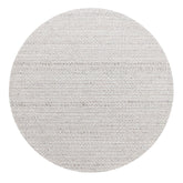 Rond vloerkleed Nirvana van MUST Living in grijze wol en polyester met een doorsnede van 150 cm