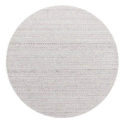 Rond vloerkleed Nirvana van MUST Living in grijze wol en polyester met een doorsnede van 150 cm