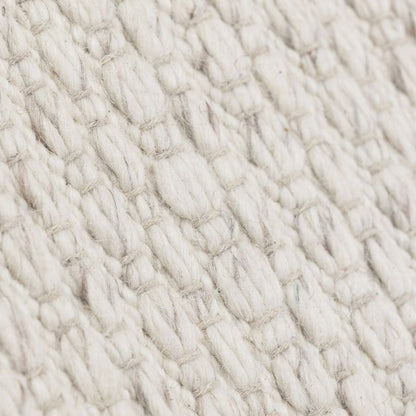 Detailfoto van Vloerkleed Nirvana Ivoor 170x240cm van MUST Living met zichtbare structuur van het materiaal